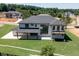 Luxury home with a patio and balcony, seen from above at 553 Versailles Dr, Auburn, GA 30011