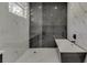 Spa-like bathroom with walk-in shower and soaking tub at 553 Versailles Dr, Auburn, GA 30011