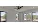 Bright bedroom with large windows and ceiling fan at 553 Versailles Dr, Auburn, GA 30011