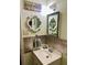 Small bathroom with updated vanity and mirror at 2805 Macon Se Dr # 26E, Atlanta, GA 30354