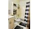 Functional bathroom with shower-tub combo and vanity storage at 2805 Macon Se Dr # 26E, Atlanta, GA 30354