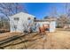 View of the home's backyard with a small wood deck at 3670 Leisure Ln, Atlanta, GA 30349