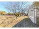 Backyard with a large tree and grass at 3670 Leisure Ln, Atlanta, GA 30349