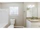 Bathroom featuring a granite countertop vanity and tile flooring at 3670 Leisure Ln, Atlanta, GA 30349