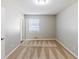 Bedroom with neutral walls, carpet flooring, and a window at 3670 Leisure Ln, Atlanta, GA 30349
