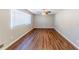 Bright living room featuring hardwood floors, neutral walls, and a ceiling fan at 3670 Leisure Ln, Atlanta, GA 30349