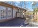 Spacious back deck features natural light and access to the home's interior via double doors at 4388 Coleman Dr, Stone Mountain, GA 30083