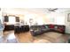 Open living space with kitchen, island, and sectional sofa at 7229 Deering Ct, Douglasville, GA 30134