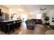 Open living area with sectional sofa and wood floors at 7229 Deering Ct, Douglasville, GA 30134