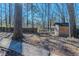 Wooded backyard with a shed and garden at 3887 Mcgill Ln, Decatur, GA 30034
