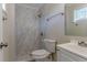 Modern bathroom with marble shower and white vanity at 3887 Mcgill Ln, Decatur, GA 30034