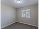 Spacious bedroom with window and neutral wall paint at 3887 Mcgill Ln, Decatur, GA 30034