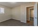 Bright bedroom with two windows and neutral carpet at 3887 Mcgill Ln, Decatur, GA 30034