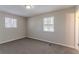 Spacious bedroom with neutral walls and carpet at 3887 Mcgill Ln, Decatur, GA 30034