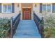 Brick steps leading to charming front door with wood accents at 3887 Mcgill Ln, Decatur, GA 30034