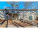 Back of house with deck, patio, and fenced yard at 3887 Mcgill Ln, Decatur, GA 30034