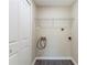 Basement laundry room with shelving and hookups at 3887 Mcgill Ln, Decatur, GA 30034