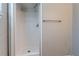 Standing shower with white surround and chrome hardware at 5938 Baywood Ln, Riverdale, GA 30296