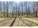 Wooded backyard showing off a lush and private natural setting at 920 Navajo Trl, Covington, GA 30016