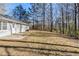 Large backyard with a patio, perfect for entertaining or relaxing outdoors at 920 Navajo Trl, Covington, GA 30016