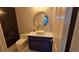 Chic bathroom featuring modern fixtures, vessel sink, and sleek glass-enclosed shower at 219 Thorncrest, Stockbridge, GA 30281