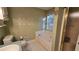 Bright bathroom featuring a soaking tub and separate shower at 219 Thorncrest, Stockbridge, GA 30281