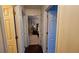 Hallway with views to multiple bedrooms at 219 Thorncrest, Stockbridge, GA 30281