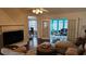 Bright and airy living room featuring high ceilings and plenty of natural light with an open floor plan at 219 Thorncrest, Stockbridge, GA 30281