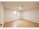 Spacious basement bedroom with a window and wood floors at 4005 Chelsea Ln, Marietta, GA 30062