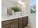 Elegant bathroom with double vanity and large mirror at 72 Sheryl Way, Loganville, GA 30052