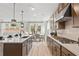 Modern kitchen featuring stainless steel appliances and island at 72 Sheryl Way, Loganville, GA 30052