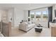Spacious loft area with windows and seating at 72 Sheryl Way, Loganville, GA 30052