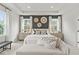 Main bedroom with a king-size bed and decor at 72 Sheryl Way, Loganville, GA 30052