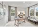 Bright home office with large windows and built-in seating at 72 Sheryl Way, Loganville, GA 30052