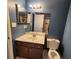 Bathroom with vanity, toilet and mirror at 2035 Powers Ferry Se Trce, Marietta, GA 30067