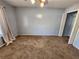 Simple bedroom with ceiling fan and carpet at 2035 Powers Ferry Se Trce, Marietta, GA 30067