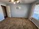 Simple bedroom with ceiling fan and carpet at 2035 Powers Ferry Se Trce, Marietta, GA 30067