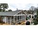 Aerial view highlighting the home's screened porch and patio at 3649 Pinehill Cir, Acworth, GA 30101