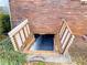 Open basement entrance with wooden access doors at 3649 Pinehill Cir, Acworth, GA 30101