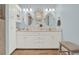 Elegant bathroom with double vanity and large mirrors at 3649 Pinehill Cir, Acworth, GA 30101