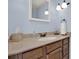 Bathroom with wood vanity and granite countertop at 3649 Pinehill Cir, Acworth, GA 30101