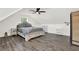 Large bedroom with ceiling fan and grey bedding at 3649 Pinehill Cir, Acworth, GA 30101