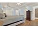 Bright bedroom featuring hardwood floors and ample closet space at 3649 Pinehill Cir, Acworth, GA 30101