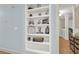 Built-in shelving with decorative items and books at 3649 Pinehill Cir, Acworth, GA 30101