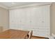 Dining room with built-in storage and hardwood floors at 3649 Pinehill Cir, Acworth, GA 30101