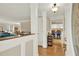 Bright entryway with hardwood floors, leading to the kitchen and living room at 3649 Pinehill Cir, Acworth, GA 30101