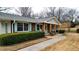 Ranch style home with brick accents, light-colored siding, and a covered porch at 3649 Pinehill Cir, Acworth, GA 30101