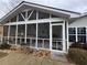 Screened porch exterior view showcasing the home's backyard at 3649 Pinehill Cir, Acworth, GA 30101
