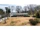 Ranch style home with a front porch and mature trees at 3649 Pinehill Cir, Acworth, GA 30101