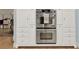 Built-in double oven and white cabinets in this kitchen at 3649 Pinehill Cir, Acworth, GA 30101